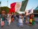 La Caravana llegando a la Basílica de Guadalupe en la Ciudad de México enarbolando la bandera de México y el estandarte de su territorio, San Sebastián Teponahuaxtlán. Foto – Werika Yuawi Hernández
