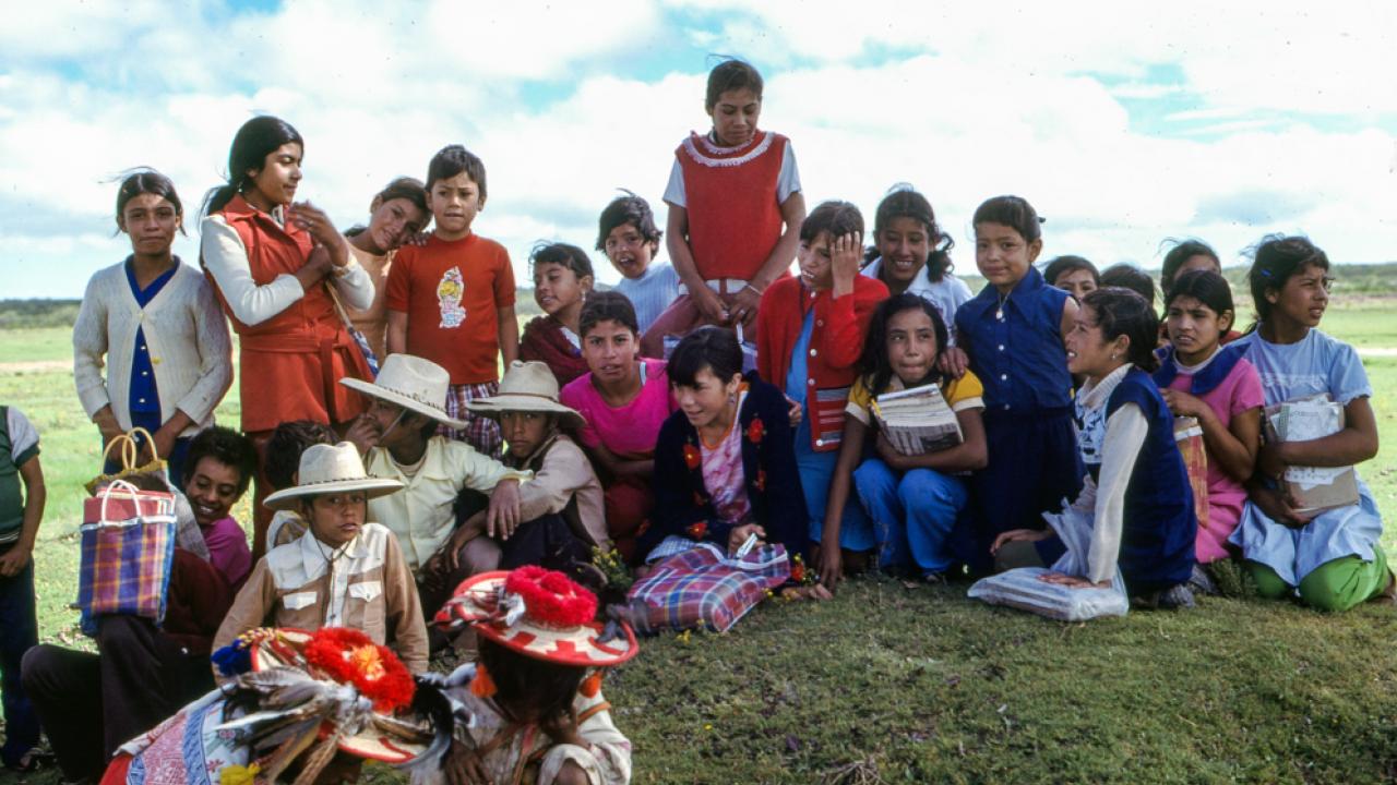 Local students observe a Wixárika shaman and his son in Wirikuta ~ Photograph ©Juan Negrín 1977 - 2023