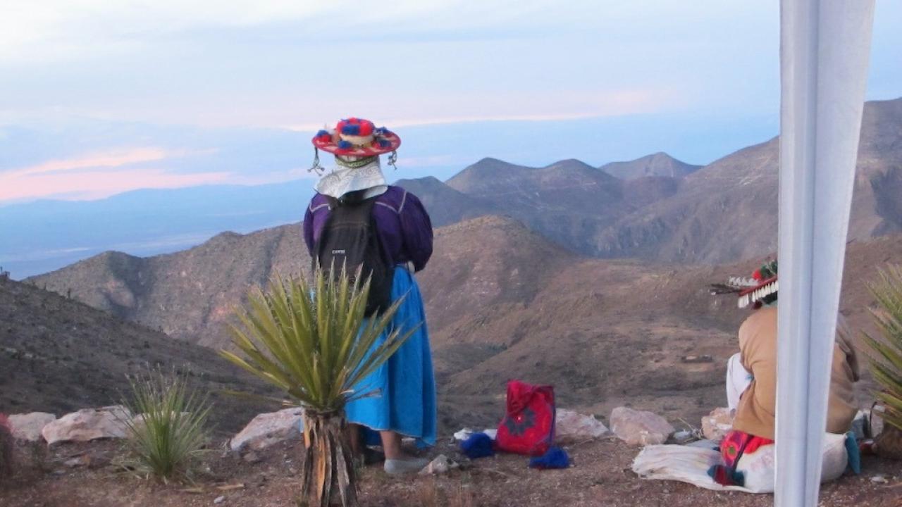  A Wixarika woman overlooks the Sierra de Catorce at dawn. (Tracy L. Barnett)