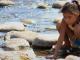 An indigenous girl plays in the San Pedro Mezquital River. | Credit: Camilo Thompson / AIDA