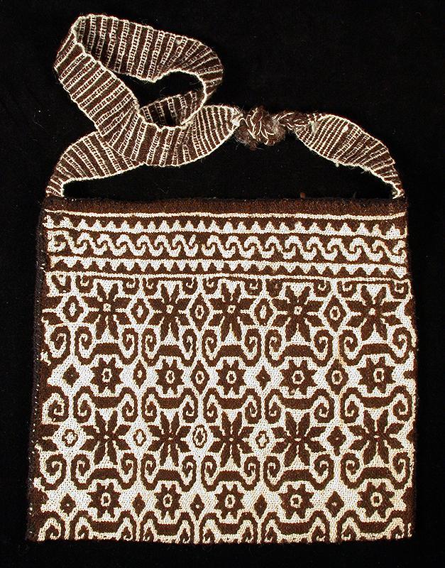 Natural brown and white wool, woven shoulder bag. Photographed by Paco Link