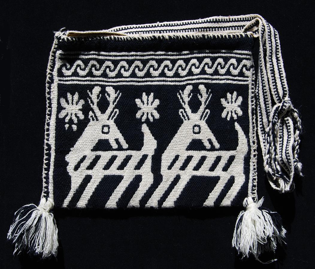 Woven black and white shoulder bag or kutsuri. 
