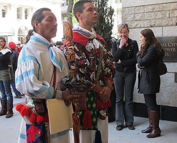 Jesús Lara Chivarra and Cilau Valadez face the entrance to First Majestic Silver Corp. headquarters in Vancouver, demanding entrance to the annual stockholders meeting. Photograph ©Tracy Barnett